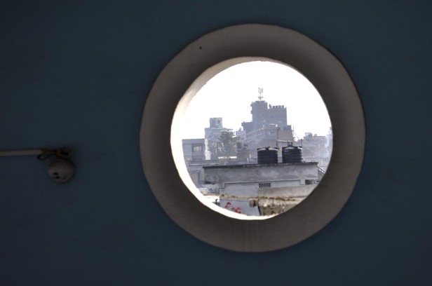 A peephole window on the landing between the fourth and fifth floors of the Kathmandu Guest House